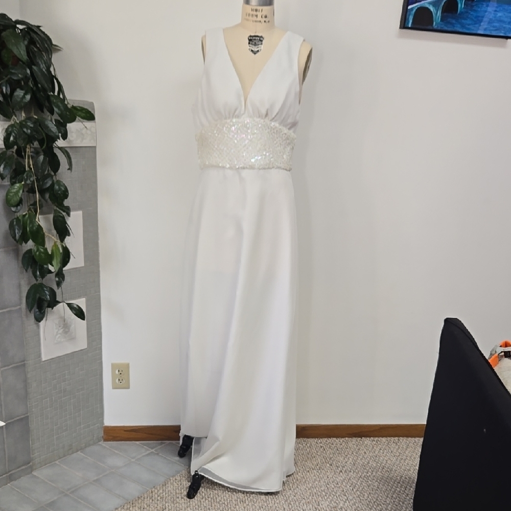 White Plunge Neck Sleeveless Wedding Gown